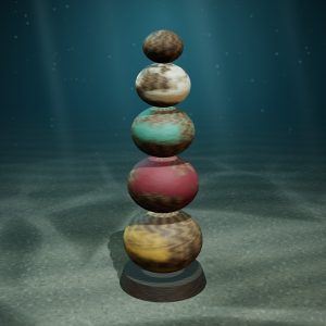 Totem of Stacked Moons — Carved & Painted Wood — photographed on the sea floor