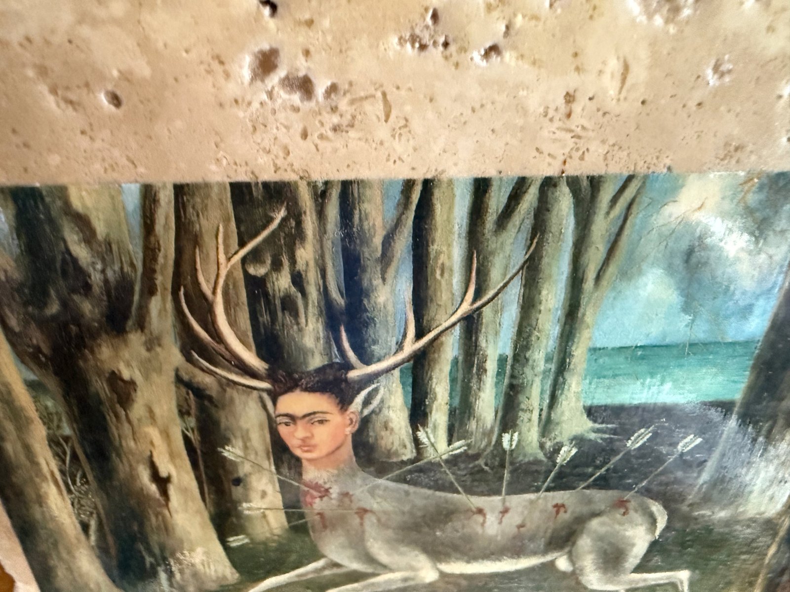 Lot 211, printed reproduction of Frida Kahlo’s The Little Deer on a travertine stone tile