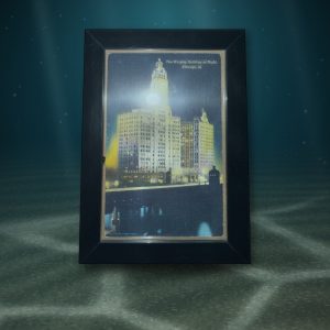 Lot 130 — The Wrigley Building at Night, Framed Postcard